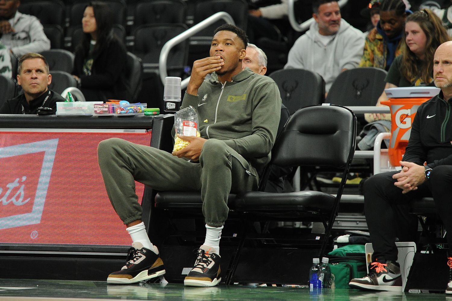 Milwaukee Bucks forward Giannis Antetokounmpo eating popcorn